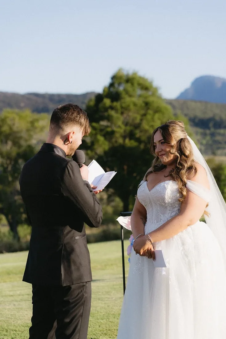 Groom reading his vows to Chelsea during the ceremony