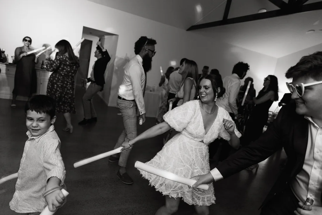 Guests dancing at the reception inside the Maroon Hill Estate function room