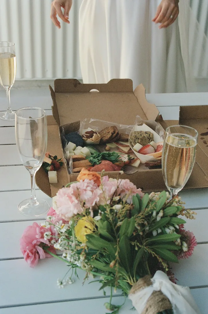 Catering buffet trays of food laid out on a table