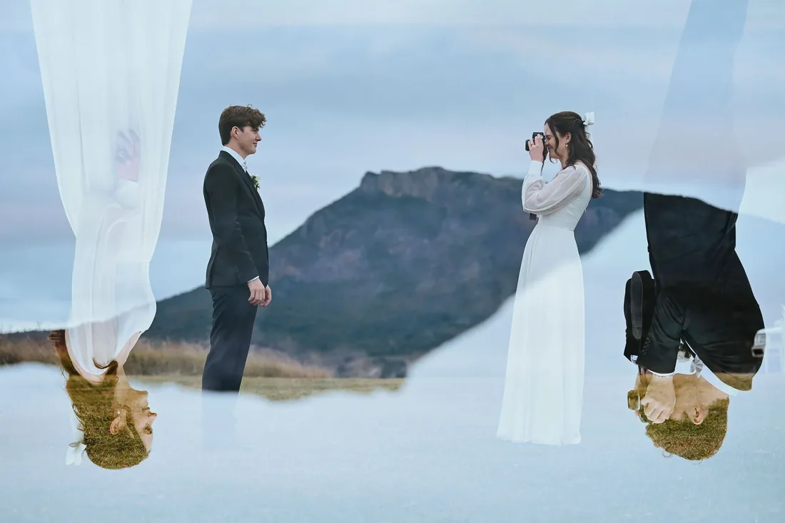 Double-exposure creative portrait of Melanie and Nathan facing each other with the mountain between them
