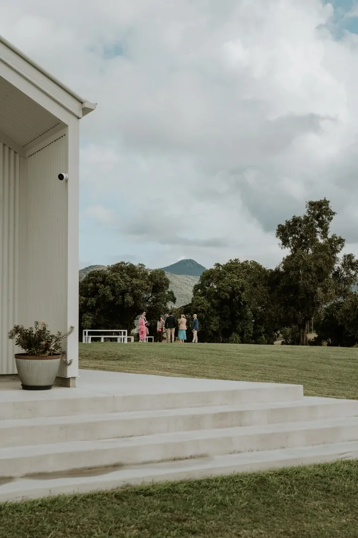 Guests gathering outside the venue building before the ceremony