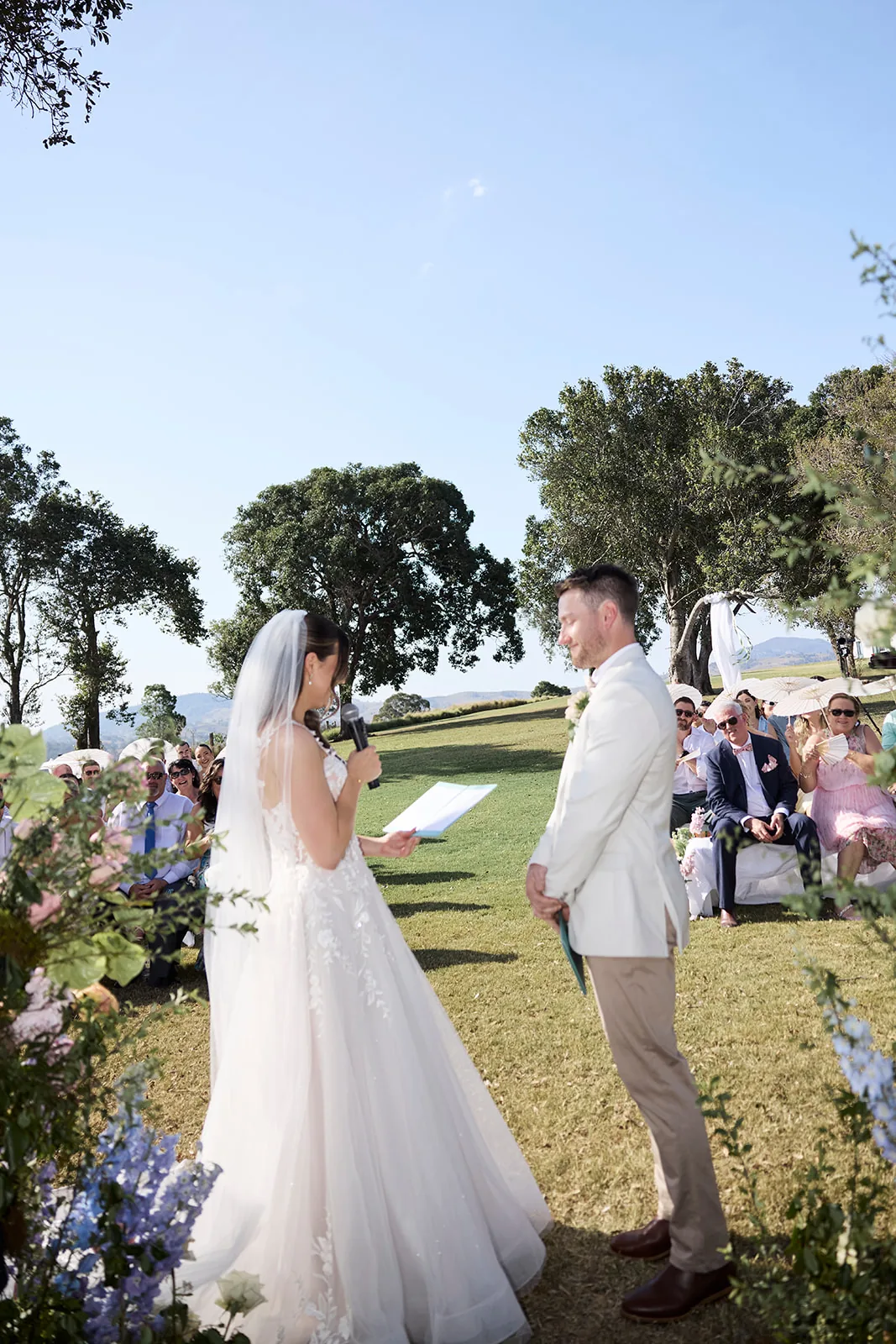 Taylor reading her vows aloud to Jayden during the ceremony